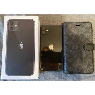 アイフォーン(iPhone)のiPhone11本体64GBブラックcoach手帳型ケース付き(スマートフォン本体)