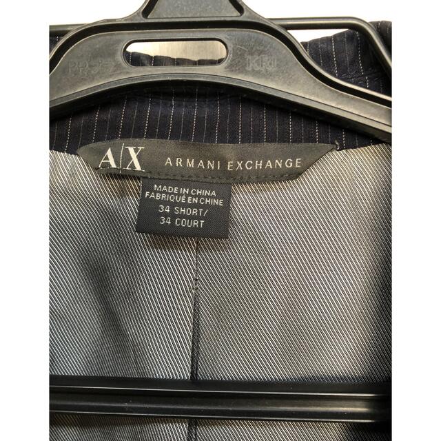 ARMANI EXCHANGE(アルマーニエクスチェンジ)のアルマーニ　紺のストラップジャケット メンズのジャケット/アウター(テーラードジャケット)の商品写真