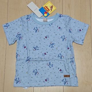 プティマイン(petit main)の【新品】 100 プティマイン おさるのジョージ 総柄 Tシャツ ライトブルー(Tシャツ/カットソー)