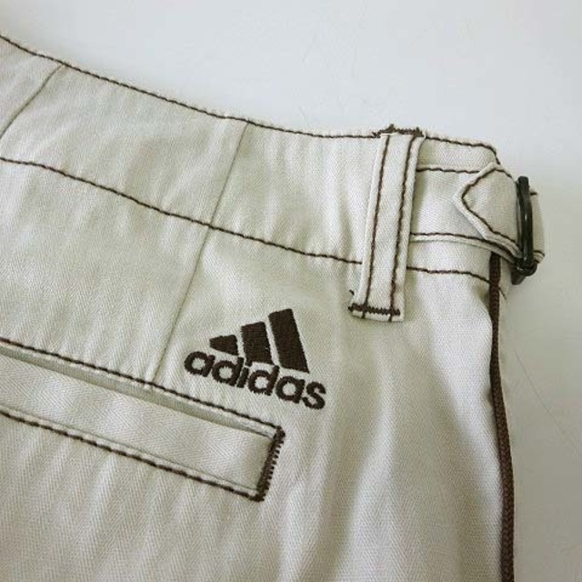 adidas(アディダス)のアディダス ゴルフ パンツ ロゴ 刺繍 91 ベージュ 茶 タグ付 美品 スポーツ/アウトドアのゴルフ(ウエア)の商品写真