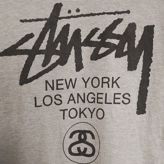 STUSSY   WORLD TOUR長袖TシャツSサイズ灰色グレー黒STUSSY大都市ロン