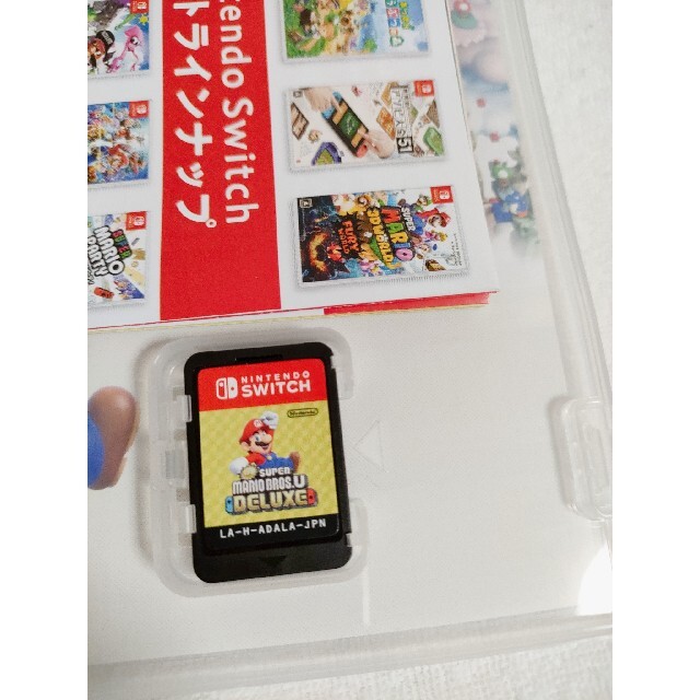 任天堂(ニンテンドウ)のNew スーパーマリオブラザーズ U デラックス Switch エンタメ/ホビーのゲームソフト/ゲーム機本体(家庭用ゲームソフト)の商品写真