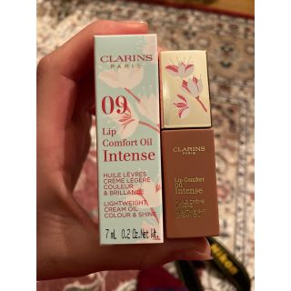 クラランス(CLARINS)のコンフォート リップオイル インテンス 09 ウォームローズ(口紅)