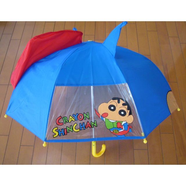値下げ中●子供用耳付き傘・クレヨンしんちゃん・雨の日が楽しくなりそう・新品 キッズ/ベビー/マタニティのこども用ファッション小物(傘)の商品写真