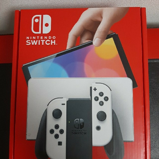 新座買蔵 Nintendo Switch 有機ELモデル 箱の一部破れあり 新品未開封