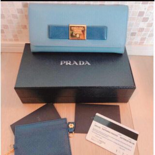 プラダ(PRADA)の【レア限定品】 PRADA（プラダ）リボン付きフラップ長財布 ブルー(財布)