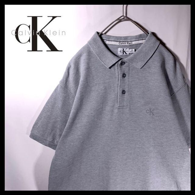 Calvin Klein(カルバンクライン)の90s 古着 CK カルバンクライン ポロシャツ グレー ワンポイント刺繍ロゴ メンズのトップス(ポロシャツ)の商品写真