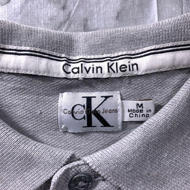 Calvin Klein(カルバンクライン)の90s 古着 CK カルバンクライン ポロシャツ グレー ワンポイント刺繍ロゴ メンズのトップス(ポロシャツ)の商品写真