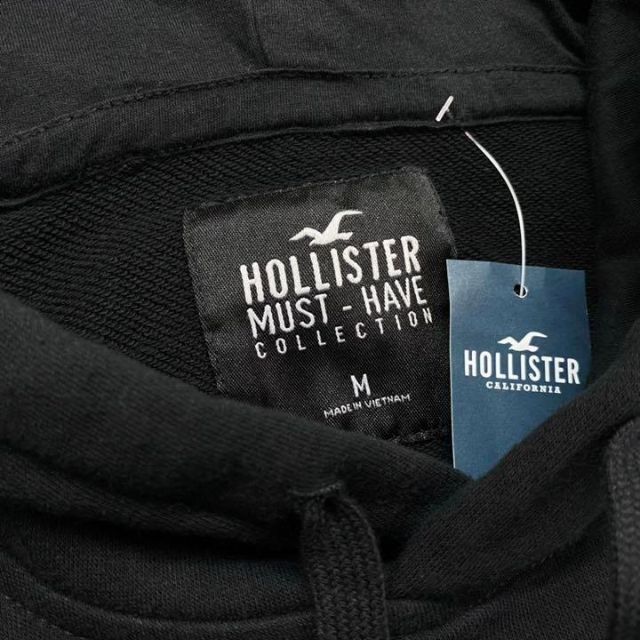 Hollister(ホリスター)の新品【メンズXS】★ホリスター★人気のワンポイント！無地パーカー/黒 メンズのトップス(パーカー)の商品写真