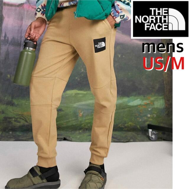 THE NORTH FACE(ザノースフェイス)の【海外限定】TNF ジョガーパンツ メンズ  ブラウン　US/M 日本サイズL メンズのパンツ(その他)の商品写真