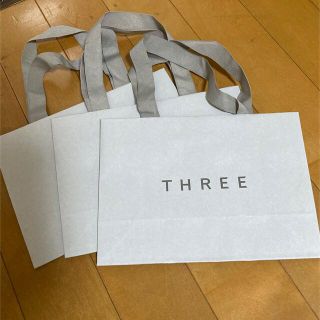 スリー(THREE)のthree ショップ袋(ショップ袋)