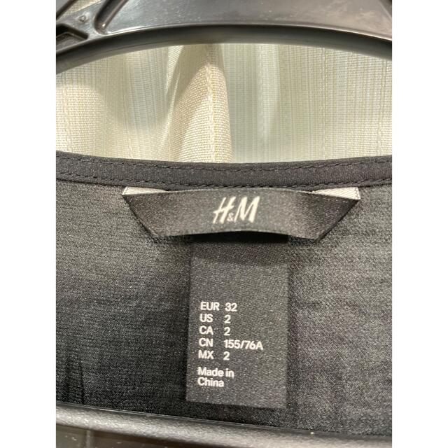 H&M(エイチアンドエム)のH&M ワンピース　黒　ミニワンピ レディースのワンピース(ミニワンピース)の商品写真