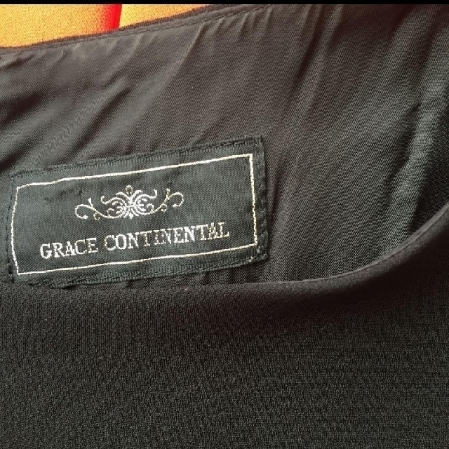 GRACE CONTINENTAL(グレースコンチネンタル)のグレースコンチネンタル☆バックリボンフリルワンピース レディースのワンピース(ひざ丈ワンピース)の商品写真