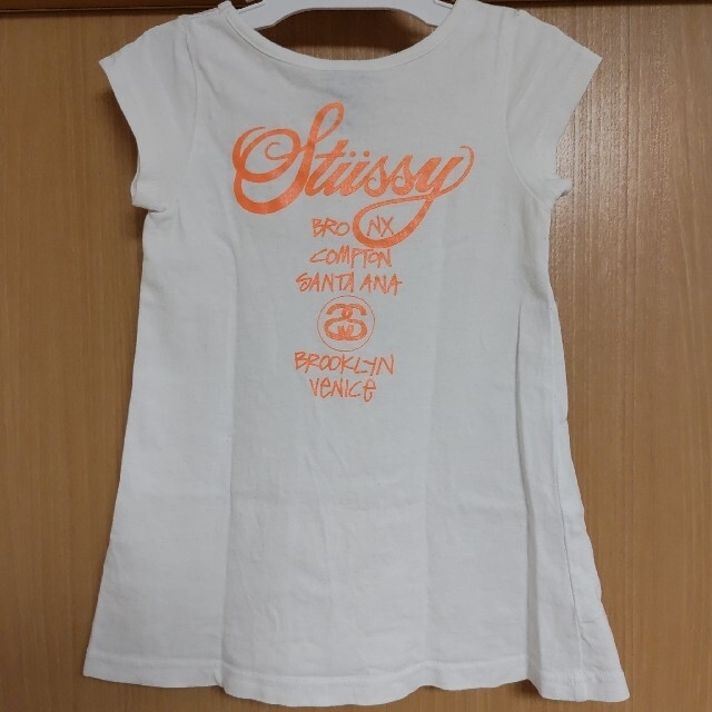 STUSSY - ワールドツアーSTUSSYワンピースTシャツ白オレンジ太陽 STUSSY - ワールドツアーSTUSSYワンピースTシャツ白オレンジ太陽