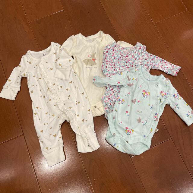 babyGAP(ベビーギャップ)のbaby gap ロンパース ボディースーツ　up to 7lbs ４枚セット キッズ/ベビー/マタニティのベビー服(~85cm)(ロンパース)の商品写真