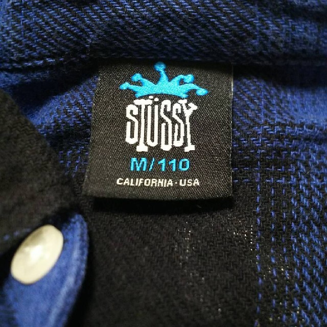 STUSSY(ステューシー)のワンピースSTUSSYワールドツアーKIDSチェックシャツ青ブルー黒M110cm キッズ/ベビー/マタニティのキッズ服女の子用(90cm~)(ワンピース)の商品写真