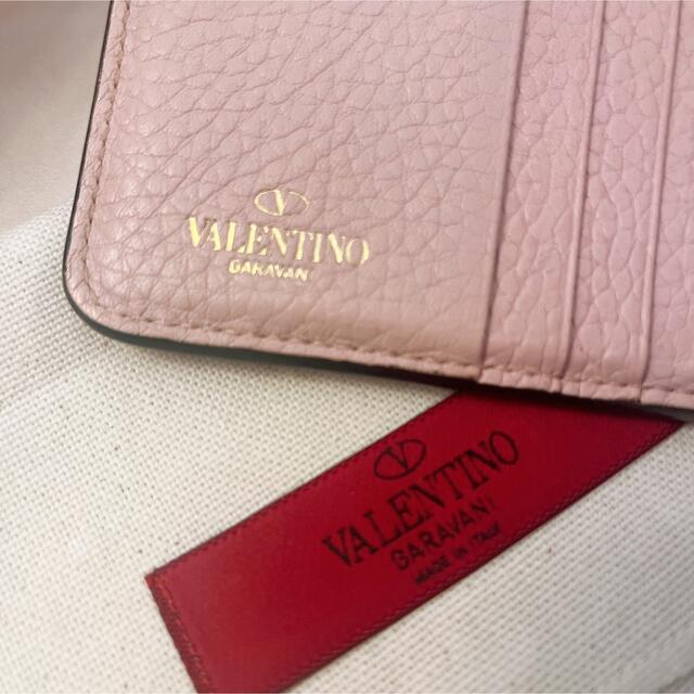 valentino garavani(ヴァレンティノガラヴァーニ)のVALENTINO ヴァレンティノ ロックスタッズ 二つ折り財布 ピンク  美品 レディースのファッション小物(財布)の商品写真