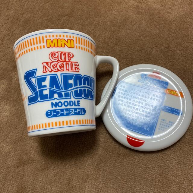 日清食品(ニッシンショクヒン)のマグカップ 日清食品 カップヌードル CUP NOODLE シーフードヌードル  インテリア/住まい/日用品のキッチン/食器(グラス/カップ)の商品写真