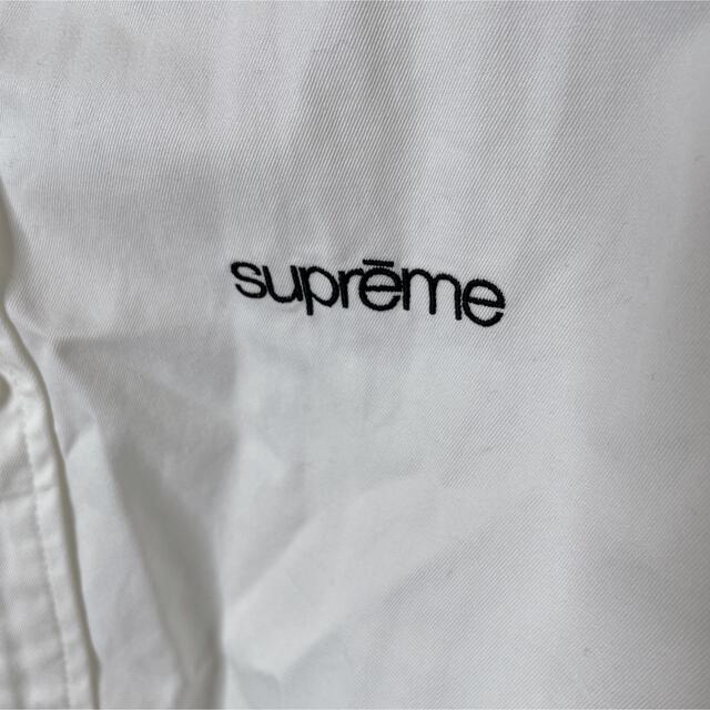 whimさん　supremeボタンダウンシャツ　kawsboxlogoフーディ