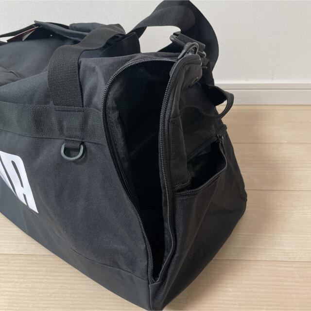 PUMA(プーマ)の【新品】PUMA プーマ　ボストンバッグ　Mサイズ　58L 黒　ブラック インテリア/住まい/日用品の日用品/生活雑貨/旅行(旅行用品)の商品写真