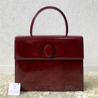 カルティエ(Cartier)のカルティエ　ハンドバッグ　ハッピーバースデー　ターンロック　エナメル　ボルドー(ハンドバッグ)