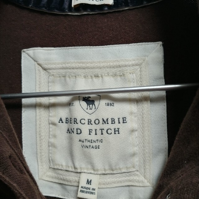 Abercrombie&Fitch(アバクロンビーアンドフィッチ)のアバクロ　ストレッチ　ポロ　Ｍ　レディース　茶色　細身 レディースのトップス(ポロシャツ)の商品写真