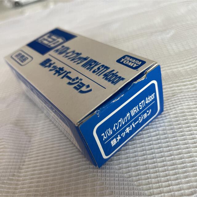 Takara Tomy(タカラトミー)の《非売品》トミカ スバル インプレッサ WRX STI 4door 銀メッキ エンタメ/ホビーのおもちゃ/ぬいぐるみ(ミニカー)の商品写真