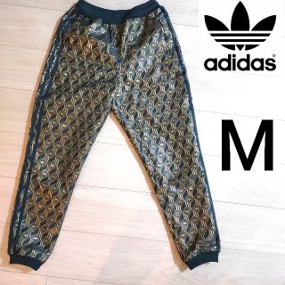 アディダス(adidas)のadidas 女性M 総柄 モノグラム ジャージ トラックパンツ Lisa着用(その他)