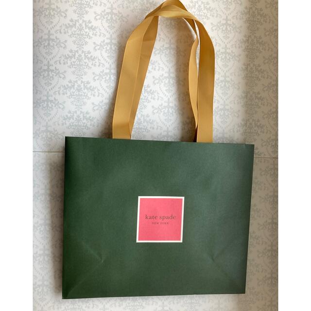 kate spade new york(ケイトスペードニューヨーク)のKate spadeケイトスペード紙袋、コースター、ペーパーピクニックシート レディースのバッグ(ショップ袋)の商品写真