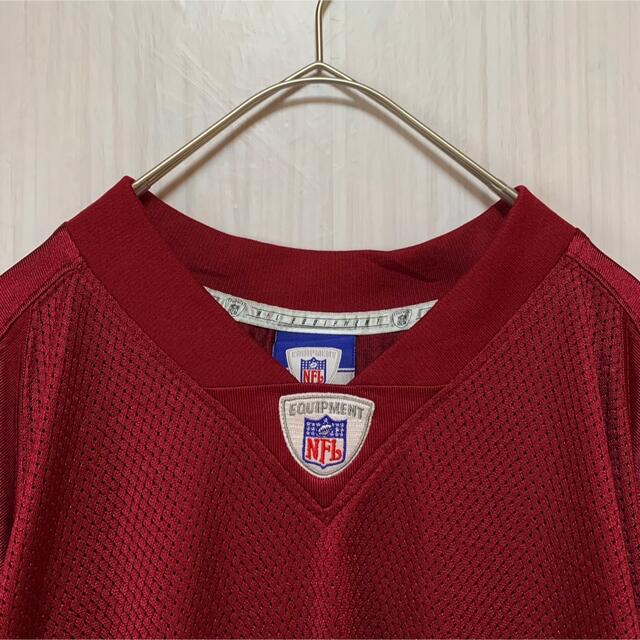 Reebok(リーボック)のリーボックNFL半袖ゲームシャツナンバリングビッグプリント刺繍ロゴアメリカ古着 メンズのトップス(Tシャツ/カットソー(半袖/袖なし))の商品写真