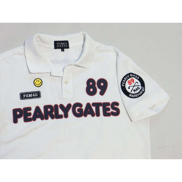 PEARLY パーリーゲイツ 白で襟の裏側にニコちゃんが付いた半袖