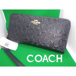 コーチ(COACH)のCOACHコーチブラックエンボスリストレット付き長財布高級感あり(財布)