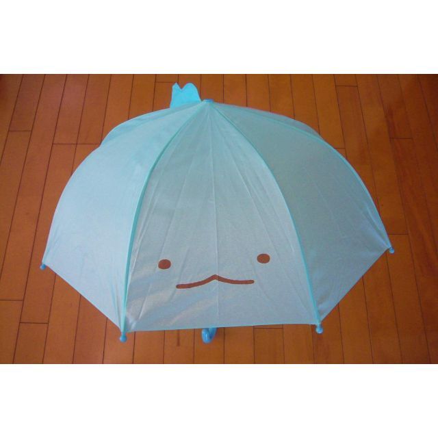値下げ中●子供用耳付き傘・すみっコぐらし　とかげ・雨の日が楽しい・新品 キッズ/ベビー/マタニティのこども用ファッション小物(傘)の商品写真