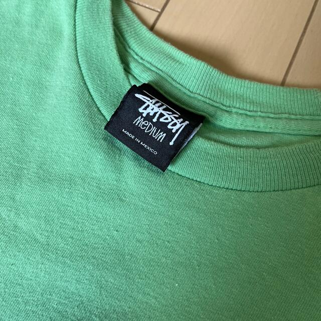 STUSSY(ステューシー)の[古着] STUSSY Tシャツ ライムグリーン サーフマン メンズのトップス(Tシャツ/カットソー(半袖/袖なし))の商品写真