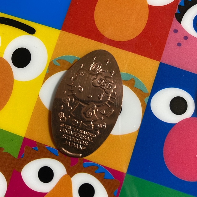 USJ(ユニバーサルスタジオジャパン)のUSJ メダル　10周年　ハローキティ　3枚セット　消毒・研磨済 エンタメ/ホビーのコレクション(その他)の商品写真
