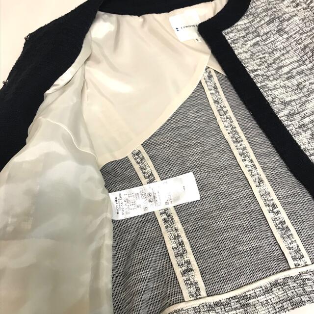 kumikyoku（組曲）(クミキョク)の組曲 ノーカラースーツ ツイードスーツクリーニング済白紺色ネイビー ブランド レディースのフォーマル/ドレス(スーツ)の商品写真