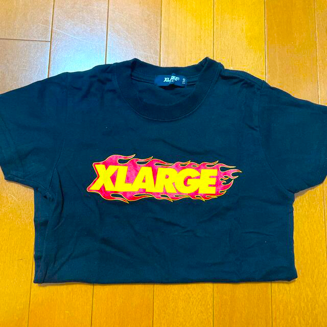 XLARGE(エクストララージ)のXLARGE KIDS ファイヤーロゴ Tシャツ 110 キッズ/ベビー/マタニティのキッズ服男の子用(90cm~)(Tシャツ/カットソー)の商品写真
