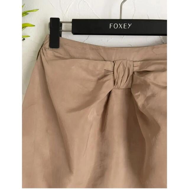 FOXEY(フォクシー)のフォクシー FOXEY  38 ベージュ リボン スカート レディースのスカート(ひざ丈スカート)の商品写真