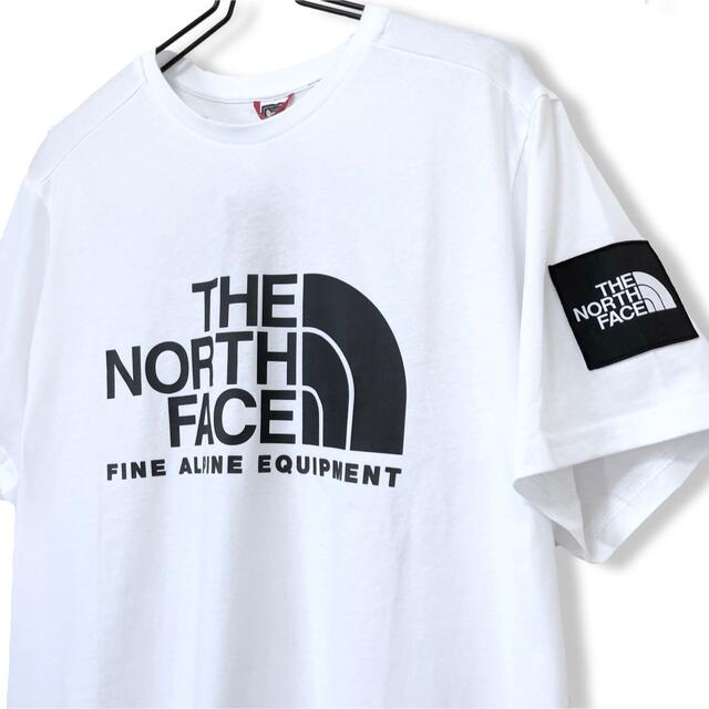 THE NORTH FACE(ザノースフェイス)のワッペン♪ 新品 ノースフェイス ファイン アルパイン Tシャツ EU 白 L メンズのトップス(Tシャツ/カットソー(半袖/袖なし))の商品写真