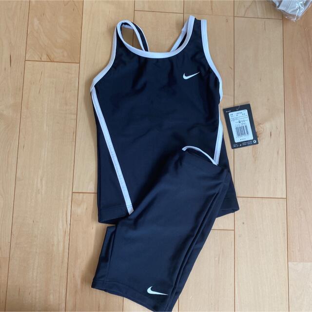 NIKE(ナイキ)の新品 ナイキ 水着 セットアップ 女の子 ブラック 120㎝ キッズ/ベビー/マタニティのキッズ服女の子用(90cm~)(水着)の商品写真