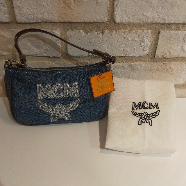 MCM(エムシーエム)のチーちゃん様専用✨新品未使用！MCMポーチ！デニムのような生地 レディースのファッション小物(ポーチ)の商品写真