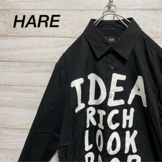 ハレ(HARE)のHARE フロントプリントシャツ ブラック モード カジュアル お洒落(シャツ)