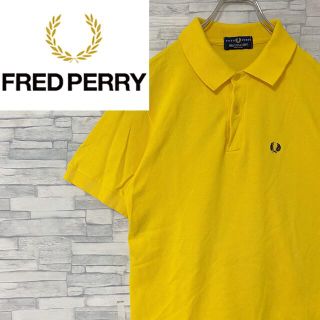 フレッドペリー(FRED PERRY)の【希少】英国製　FRED PERRYフレッドペリー  半袖ポロシャツ  黄色　M(ポロシャツ)