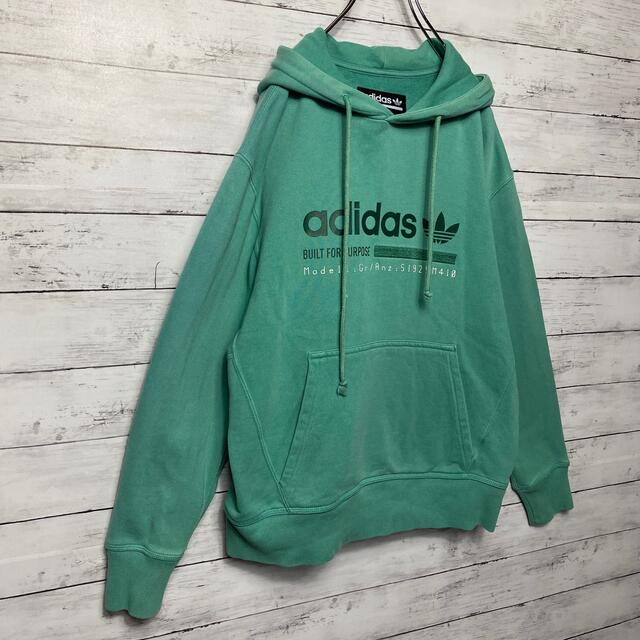 adidas(アディダス)の【希少グリーンカラー】アディダスオリジナルス⭐︎両面プリント　パーカー メンズのトップス(パーカー)の商品写真