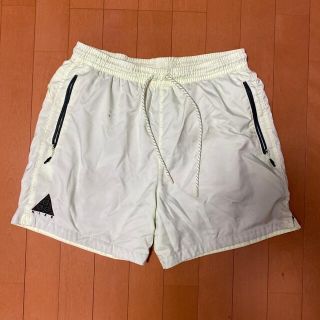 ナイキ(NIKE)のNIKE ACG ナイロンハーフパンツ　L イエロー(ショートパンツ)