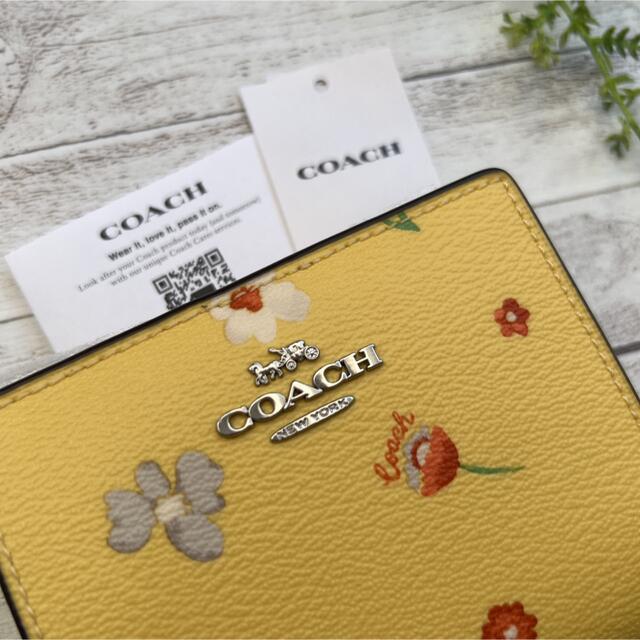 COACH   コーチ 二つ折り財布　花柄　イエロー　黄色　フローラル　新品