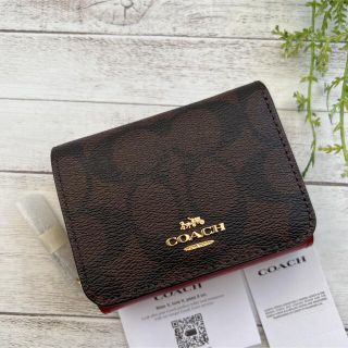 コーチ(COACH)のCOACH コーチ　三つ折り財布　シグネチャー レッド　赤色　折り財布(財布)