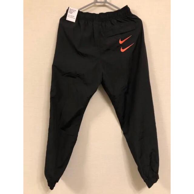 NIKE(ナイキ)の最安値 新品未使用 希少 M NIKE BIG SWOOSH ウーブン パンツ メンズのパンツ(その他)の商品写真