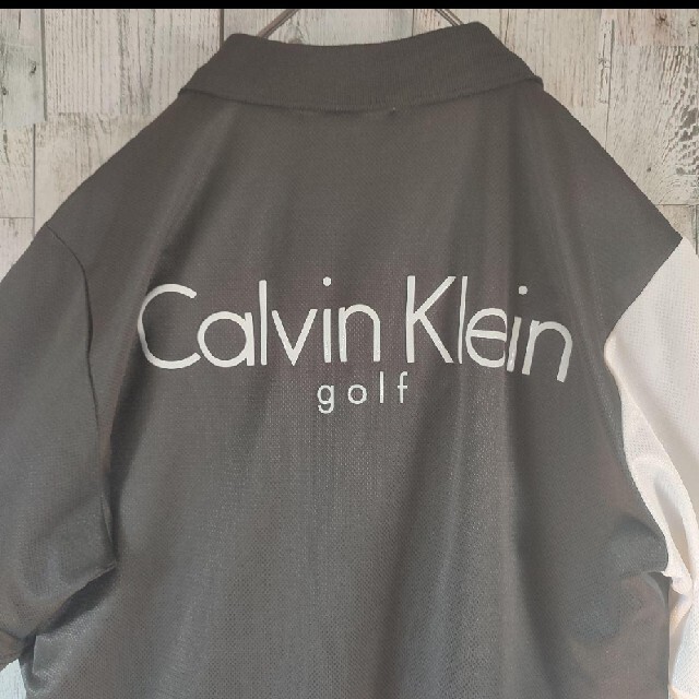 Calvin Klein(カルバンクライン)のたー様専用カルバンクラインゴルフツートンカラーポロシャツバック デカロゴ 古着 スポーツ/アウトドアのゴルフ(ウエア)の商品写真