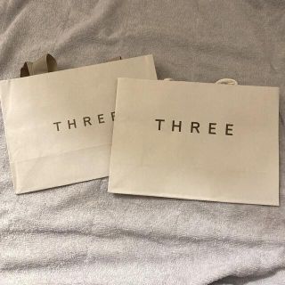 スリー(THREE)のTHREE ショッパー　紙袋(ショップ袋)